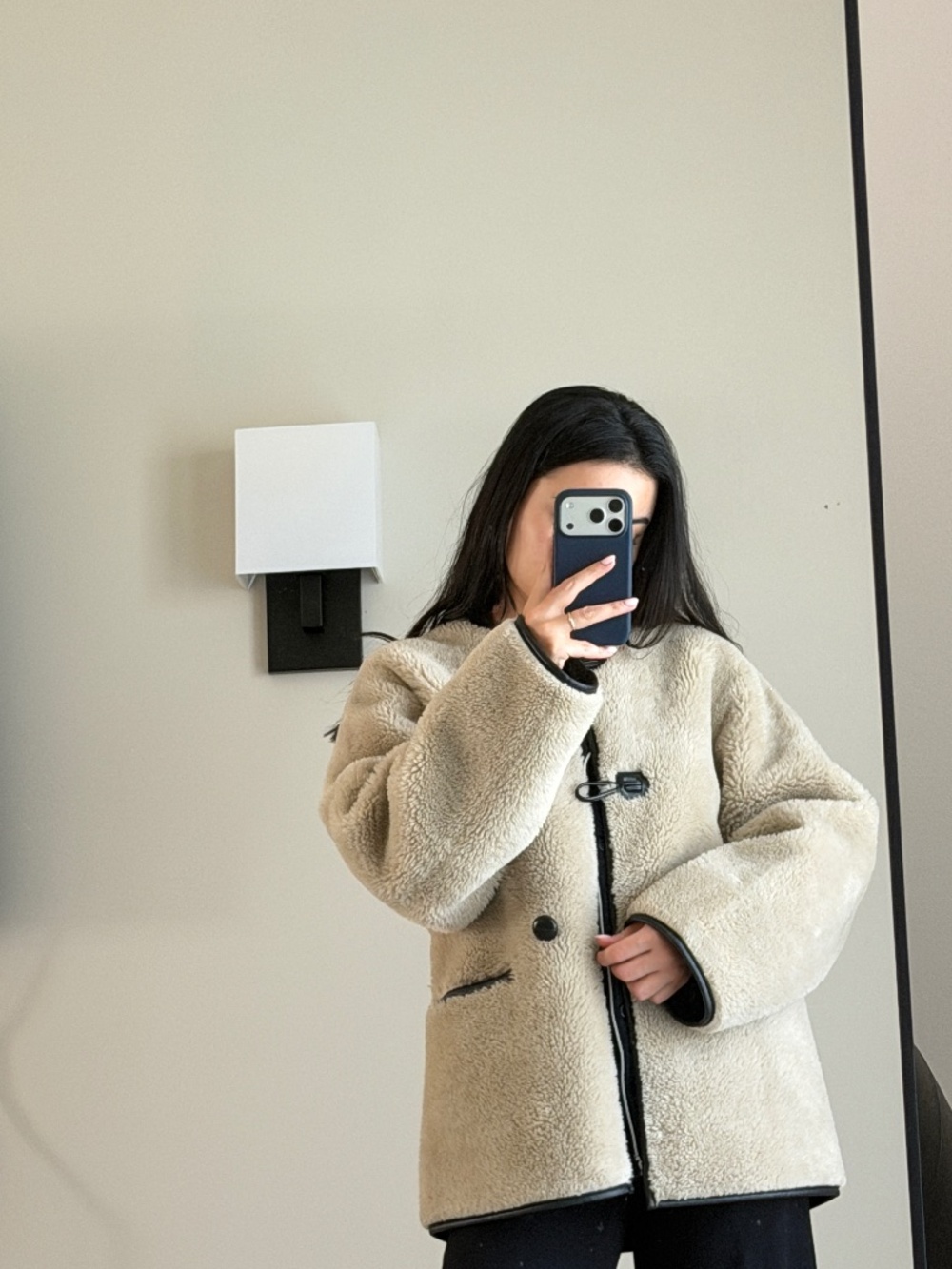 Fur-effect coat with appliqués